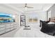Bedroom with tray ceiling, large TV, and neutral decor at 13102 Petrel Pl, Charlotte, NC 28278