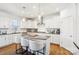 Beautiful kitchen with stainless steel appliances, granite counters and an island with bar stool seating at 13102 Petrel Pl, Charlotte, NC 28278