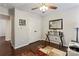 Versatile office/bedroom with hardwood floors, ample closet space, and a modern desk at 140 Camforth Dr, Mooresville, NC 28117