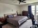 Inviting bedroom with a comfortable bed, dresser, desk, and natural light at 14022 Clayborn St, Midland, NC 28107