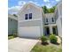 Charming two-story home with a two-car garage and manicured lawn at 14022 Clayborn St, Midland, NC 28107