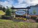 The Wynteree neighborhood entrance sign with flowerbeds, stone bases, and landscaping at 14022 Clayborn St, Midland, NC 28107