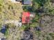 Aerial view of a charming home with a metal roof surrounded by mature trees and a nice backyard at 1421 Sherwood Dr, Kannapolis, NC 28081