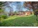 Expansive backyard view showcasing lush lawn and the home's exterior at 1421 Sherwood Dr, Kannapolis, NC 28081
