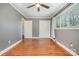 Bedroom with hardwood floors, ceiling fan, and gray walls at 1421 Sherwood Dr, Kannapolis, NC 28081