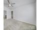 Spacious bedroom with a vaulted ceiling, neutral carpet, and ample natural light at 14256 Drake Watch Ln, Charlotte, NC 28262