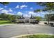 Community clubhouse with elegant architectural details and landscaping at 14256 Drake Watch Ln, Charlotte, NC 28262