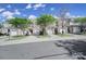 Charming townhomes with manicured lawns and attached garages at 14256 Drake Watch Ln, Charlotte, NC 28262