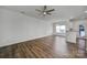 A bright and open living room featuring wood floors and ample space at 14256 Drake Watch Ln, Charlotte, NC 28262