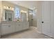Bright bathroom featuring a double vanity, decorative window, and walk-in shower with glass door at 152 Amerson Dr, Rock Hill, SC 29730