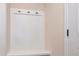 A stylish entryway featuring hooks and a shelf, offering a convenient and organized space at 152 Amerson Dr, Rock Hill, SC 29730