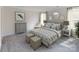 Serene main bedroom with soft lighting, neutral tones, and carpet at 1713 Braemar Village Dr, Monroe, NC 28110