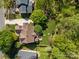 Aerial view of the property showcasing the home, yard, and surrounding landscaping at 17301 Glassfield Dr, Huntersville, NC 28078