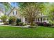 Charming two-story home with beautifully landscaped front yard and welcoming porch at 17301 Glassfield Dr, Huntersville, NC 28078