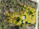 Property with defined lot lines showing a home nestled among dense trees on a well-maintained lawn at 1849 Harris Rd, Fort Mill, SC 29708