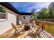 Relax on the wooden back deck with outdoor seating and a barrel table at 1849 Harris Rd, Fort Mill, SC 29708