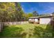 A backyard with a wooden fence and back deck at 1849 Harris Rd, Fort Mill, SC 29708