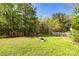 The expansive backyard features a quaint fire pit at 1849 Harris Rd, Fort Mill, SC 29708