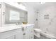 Beautiful bathroom with marble tile shower, modern vanity, and stylish mirror at 1849 Harris Rd, Fort Mill, SC 29708