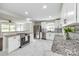Bright kitchen features stainless appliances, granite counters, and white cabinetry at 1849 Harris Rd, Fort Mill, SC 29708