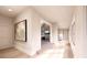 Bright and airy hallway with hardwood floors, neutral walls, and recessed lighting throughout at 20114 Norman Colony Rd, Cornelius, NC 28031