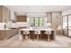 Contemporary kitchen with a center island, elegant pendant lighting, and modern appliances at 20114 Norman Colony Rd, Cornelius, NC 28031