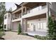 Multi-level rear exterior with balconies and an outdoor living space at 20114 Norman Colony Rd, Cornelius, NC 28031