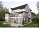Spacious outdoor entertaining deck and terrace on a new construction home with views at 20114 Norman Colony Rd, Cornelius, NC 28031