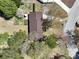 An inviting home with a sprawling yard, mature trees, and landscaped surroundings at 206 Cliffside Dr, Kannapolis, NC 28081