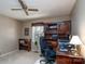 Home office space with built-in bookshelves and a comfortable workspace at 206 Cliffside Dr, Kannapolis, NC 28081