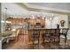 Eat-in kitchen features a breakfast bar, stainless steel appliances, and ample counter space at 2158 Hartwell Ln, Fort Mill, SC 29707