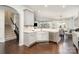 Modern kitchen featuring stainless steel appliances, grey cabinets, and an open layout to living spaces at 2248 Killian Creek Dr, Denver, NC 28037