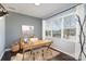 Comfortable home office with a large window, hardwood floors, and plenty of natural light at 2248 Killian Creek Dr, Denver, NC 28037