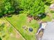 A large, well maintained backyard. It includes a trampoline and an area for relaxation at 236 Greendale Dr, Mount Holly, NC 28120