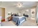 This bedroom has a ceiling fan, and a mirror door closet with an attached bathroom at 236 Greendale Dr, Mount Holly, NC 28120