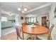 Open concept dining room leading to the kitchen and living room at 236 Greendale Dr, Mount Holly, NC 28120