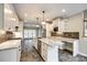 Bright kitchen with granite counters, a kitchen island, and stainless steel appliances at 2515 Barrington Ct, Rock Hill, SC 29732