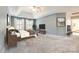 Spacious main bedroom with a ceiling fan, neutral carpet, and ample natural light at 2515 Barrington Ct, Rock Hill, SC 29732
