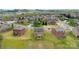 A high shot of a property surrounded by grass and some trees in a residential area at 2548 Flintshire Ln, Gastonia, NC 28056