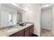 Bathroom featuring double sinks, granite countertops, vanity, and an enclosed shower/tub at 2548 Flintshire Ln, Gastonia, NC 28056