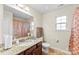 Bathroom featuring granite countertops, vanity, tiled floors, and a large mirror at 2548 Flintshire Ln, Gastonia, NC 28056