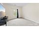 Inviting bedroom featuring neutral carpeting, fresh paint, and natural light from a window at 2548 Flintshire Ln, Gastonia, NC 28056