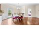 Dining area with access to the deck and featuring hardwood floors at 2548 Flintshire Ln, Gastonia, NC 28056