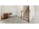 This carpeted hallway features stairs with white banisters and a neutral color scheme at 2548 Flintshire Ln, Gastonia, NC 28056