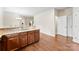 Open-concept view from the kitchen area showing the granite island and nearby doorway at 2548 Flintshire Ln, Gastonia, NC 28056