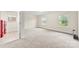 The carpeted room is brightened by two windows and includes access to the laundry room at 2548 Flintshire Ln, Gastonia, NC 28056