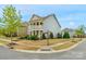 Charming two-story home with a welcoming front porch and manicured landscaping at 3013 Kensley Dr, Waxhaw, NC 28173
