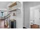 Hallway featuring shelves, shiplap walls, and access to bathroom at 3013 Kensley Dr, Waxhaw, NC 28173