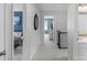Upstairs hallway with access to bedrooms, the main bathroom, and the stairwell at 3013 Kensley Dr, Waxhaw, NC 28173