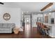 Open-concept hallway leading to a modern kitchen and front door at 3013 Kensley Dr, Waxhaw, NC 28173